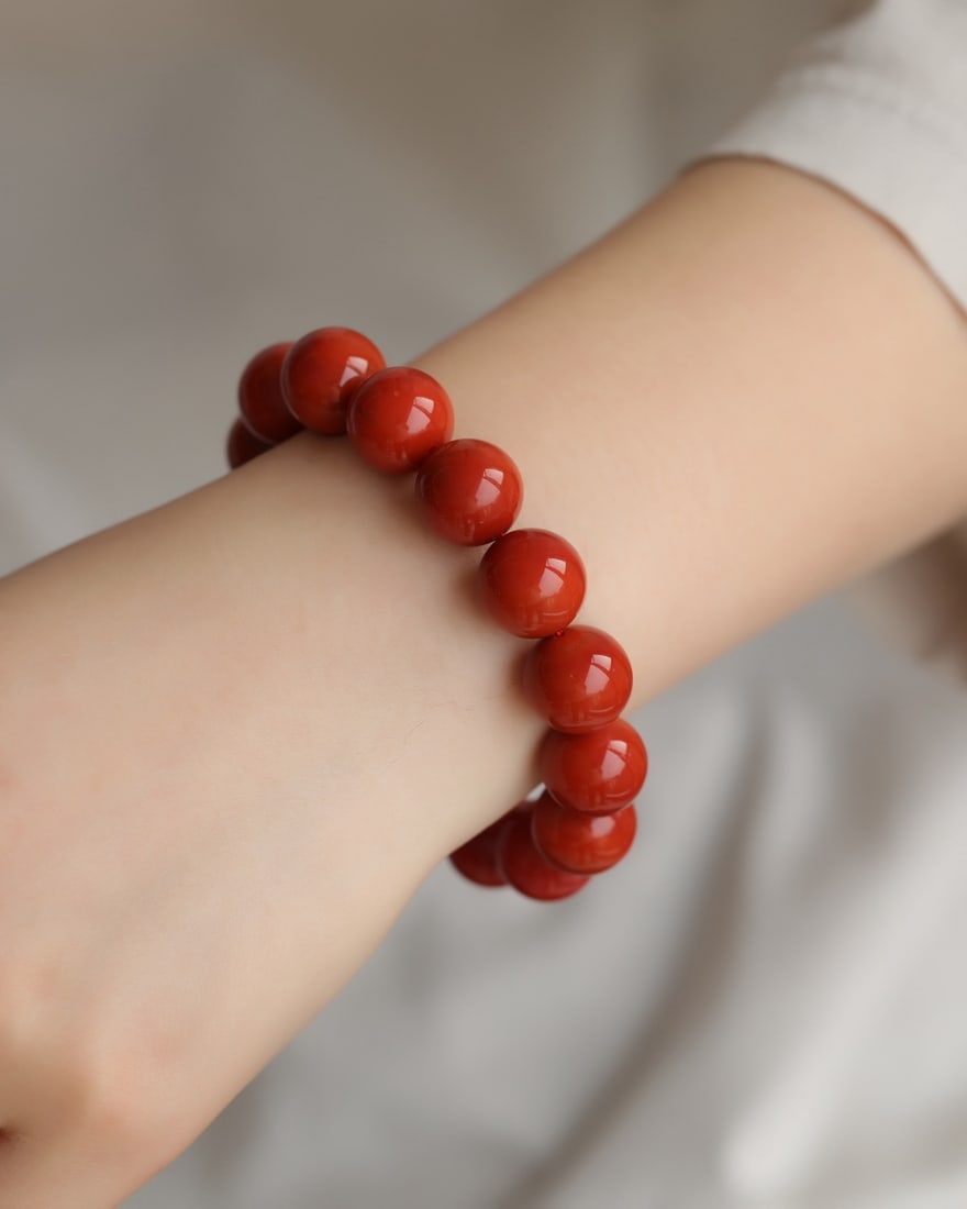 14.5mm Nanhong Agate Beads Bracelet with Certificate: Title: 14.5mm Nanhong Agate Beads Bracelet with Certificate Origin: Chinese Date/Period: After2025 Materials: Nanhong Agate Dimensions: 14.5(mm) 0.57(inches) Reserve: $999.00 Shipping: Domestic: Ship