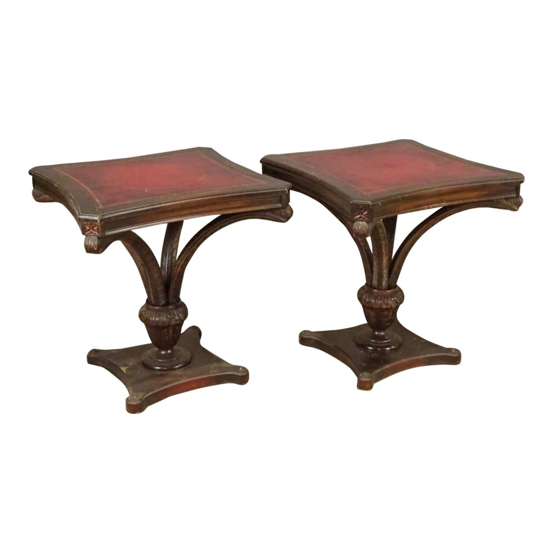1930s Pair of Traditional English Style Plume Lamp Tables Styled After the Duke of Windsor's Ostri: A pair of fancy carved mahogany leather top lamp tables. Inset red burgundy leather tops with gold trim. Styled after the ostrich plumed crest of the Duke of Windsor. 27" x 27" × 28 1/2" 