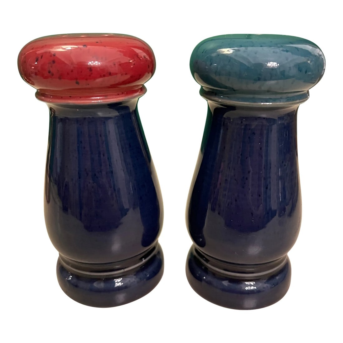 Vintage Denby Harlequin Salt and Pepper Shakers: Handcrafted Denby Harlequin blue, green and red salt and pepper shakers. Made in England. The salt shaker has one hole and it is 5 3/4' high, and the pepper shaker has several holes and it is 5 1/2'