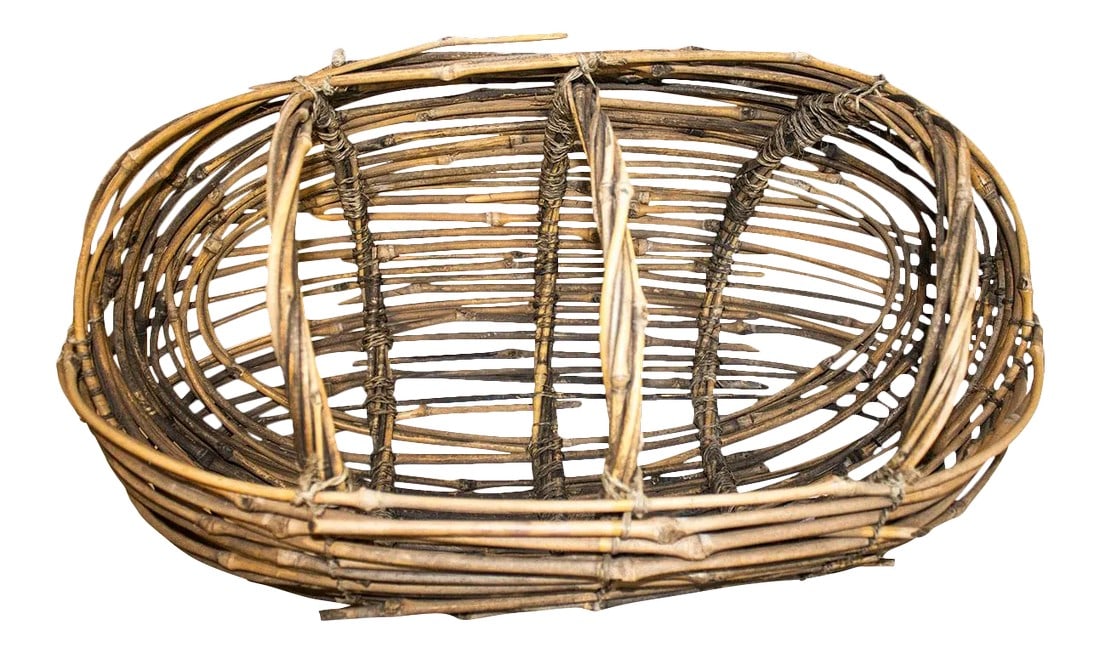 Country Woven Twig Basket: Woven twig basket as found in Big Bear, CA. Local artisans are known for basket weaving in this area using indigenous vines. There are some separated vines as would be expected in a hand crafted