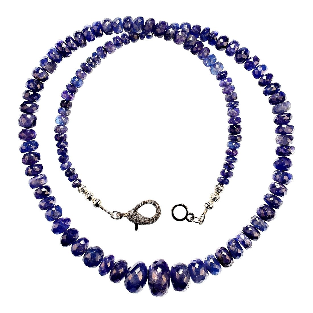 Tanzanite Necklace Graduated Purple/Blue Rondelles: This is part of Chairish's Fine Jewelry assortment. Exquisite 23-Inch Translucent Tanzanite Necklace with Diamond Chip Clasp Discover the beauty of our 23-inch Translucent Tanzanite Necklace, a