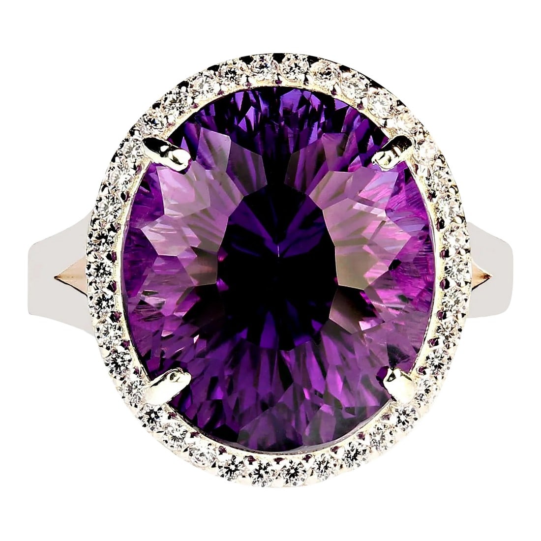 Cocktail Ring of Amethyst and Sparkling Zircons Size 8: This is part of Chairish's Fine Jewelry assortment. Elegant Evening Cocktail Ring of oval Amethyst, 12.40ct, surrounded by sparkling genuine zircons, 0.57ct. This unique amethyst is a special cut