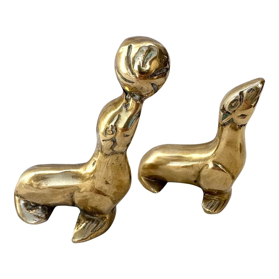 Vintage Pair of Brass Seal Figures: Vintage Pair of Brass Seal Figurines, perfect on a shelf or on a desk as paperweights. Seal w/ball-4.25in h x 2in d x 2.75w 3.25in h x 2.5in w x 1.75in d Make sure to follow me, I have flash sales