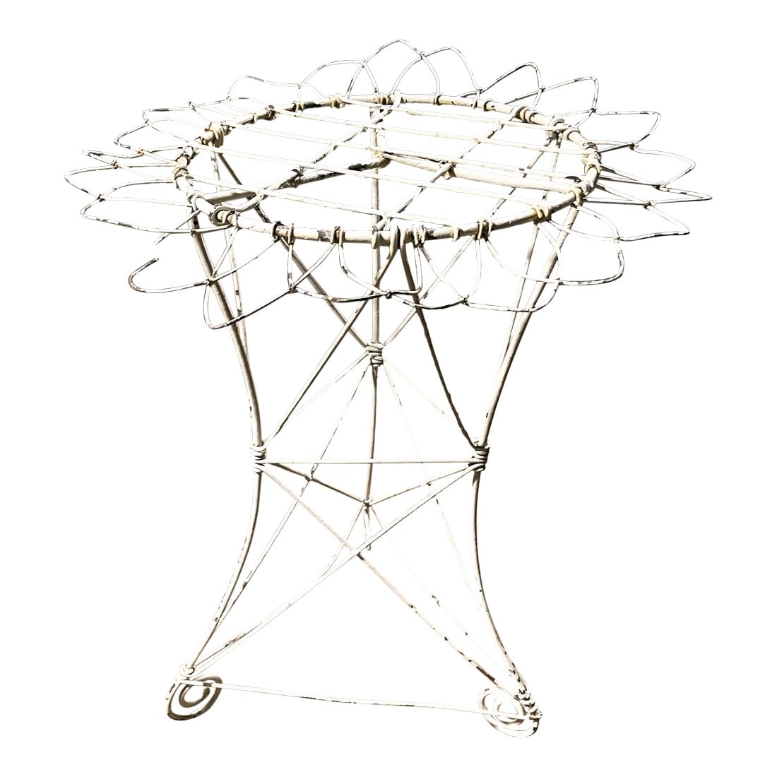 Early 20th Century Small French Iron Painted White Wire Plant Stand: This is a lovely small table or decorative stand with bent wire petals surrounding a center circle that works well with other French wire furniture, other iron furniture or even with indoor
