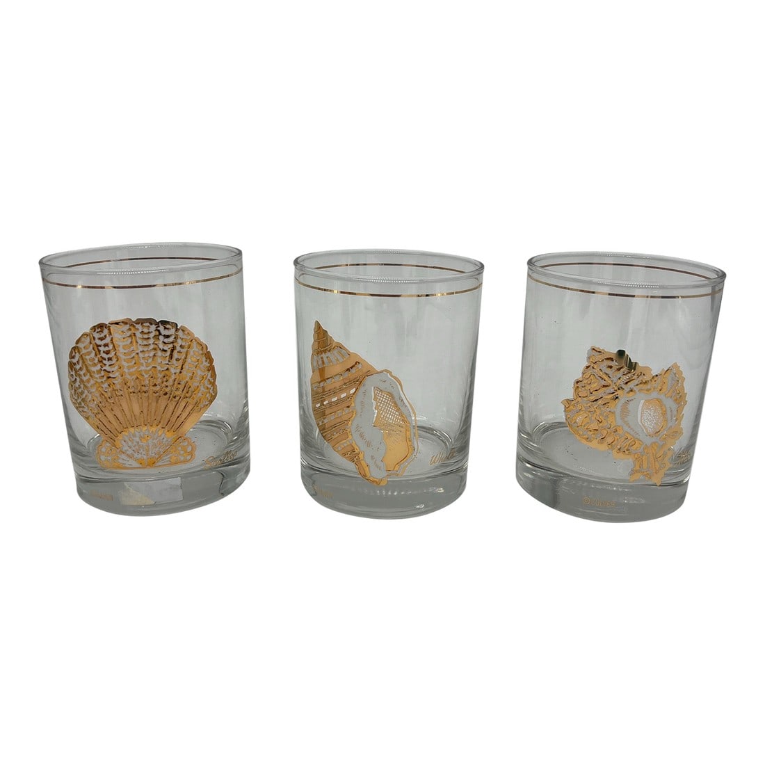1970s Culver Rocks Glasses With Seashells and 22kt Gold Trim - Set of 3: Rare set of clear Culver seashell glasses. Each glass depicts a different shell and has 22kt gold accents. These will be beautiful filled with your favorite cocktail! Condition: Alterations: