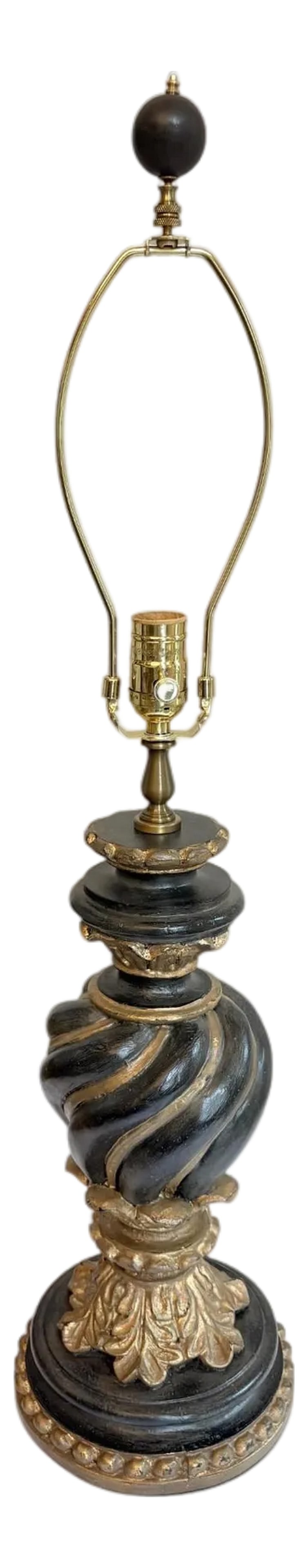 Chelsea House Spiral Black and Gold Lamp: Chelsea House Spiral Black and Gold Lamp This lamp has a round base with rope details. There is an urn shaped center that is twisted supported on top of gold leaf motifs. The manufacturer's mark