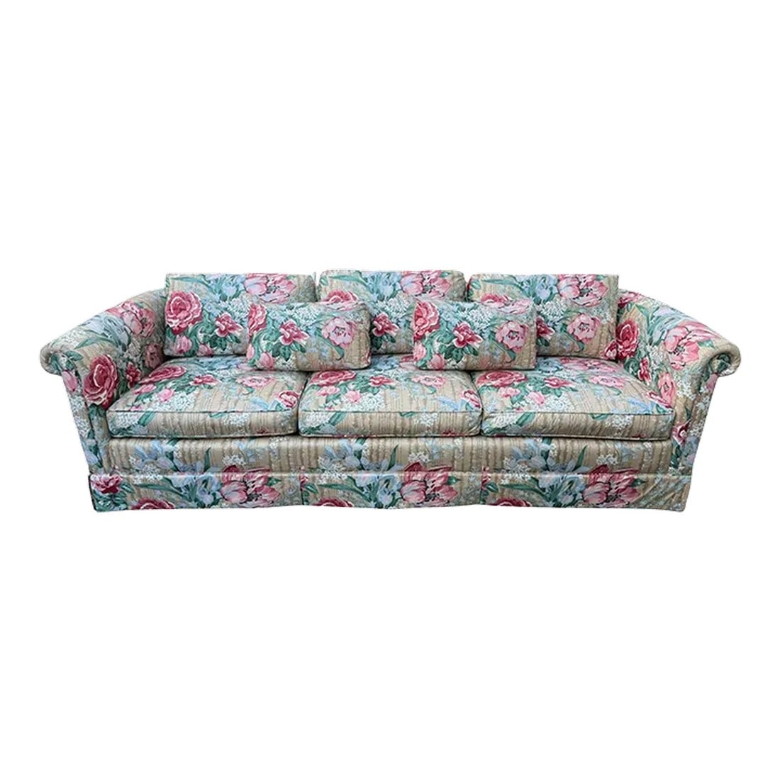 Baker Floral Rolled Arm Sofa: Quick Hits: - Baker floral rolled arm sofa - Vintage floral pattern with pink, green, and blue tones - Elegant rolled arms and deep cushions for comfort - Includes two pillows and dust skirt - Perfect