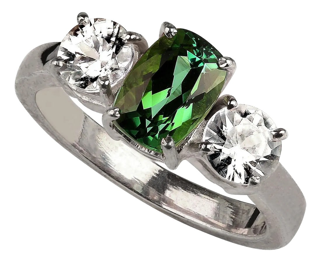 Oval Green Tourmaline Accented With Scintillating Real Zircons: This stunning ring features a vibrant 1.68-carat Brazilian oval green Tourmaline, beautifully complemented by two round genuine Zircons, totaling 1.44 carats. The combination of the rich green