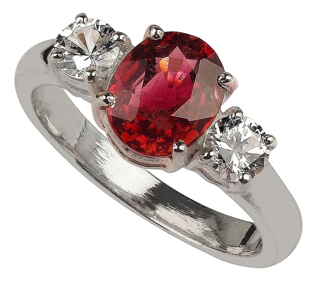Ring of Sparkling Red Tourmaline Accented With Genuine Zircons: Elevate your jewelry collection with this stunning dinner ring, showcasing a vibrant 1.71-carat red Tourmaline beautifully accented by genuine Zircons (0.61 ctw). Crafted from high-quality Sterling
