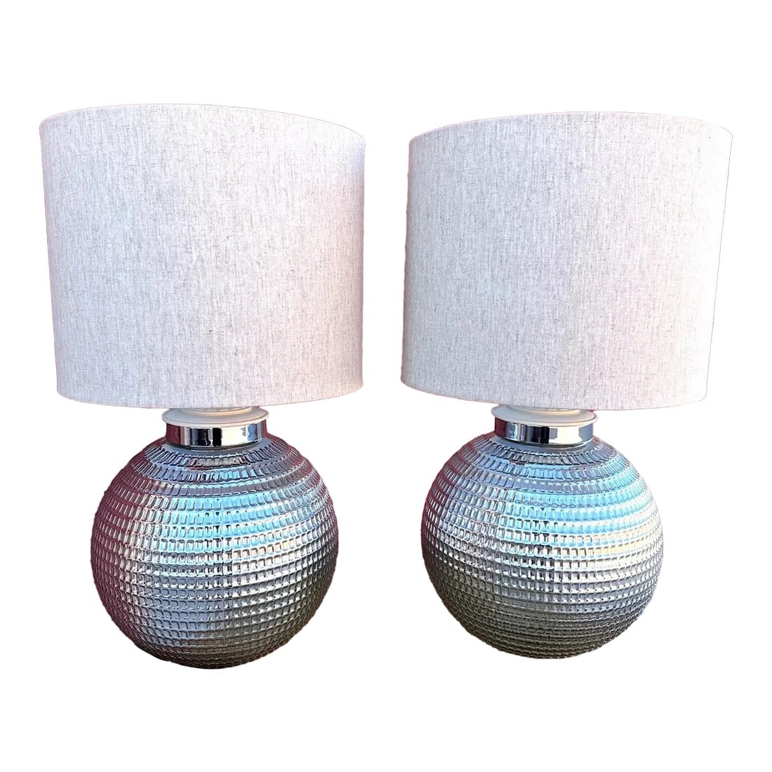 Pair of Silver Textured Glass Ball Table Lamps: Pair of Vintage Silver Textured Glass Table Lamps with a Hammered Metal Look. Neutral shades. Perfect lamps for a contemporary room. 19.5in h x 12in w 28in h to finial Shade- 15in h x 12in round Make