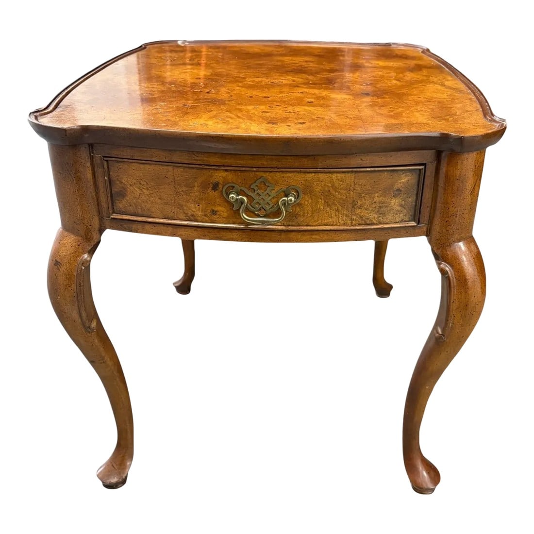 Ethan Allen Knob Creek Burl Wood Side Table: Quick Hits: - Ethan Allen Knob Creek burl wood side table - Inlay veneer - Exquisite burl wood with a rich, glossy finish - Features classic cabriole legs - Perfect for living rooms, libraries, or as