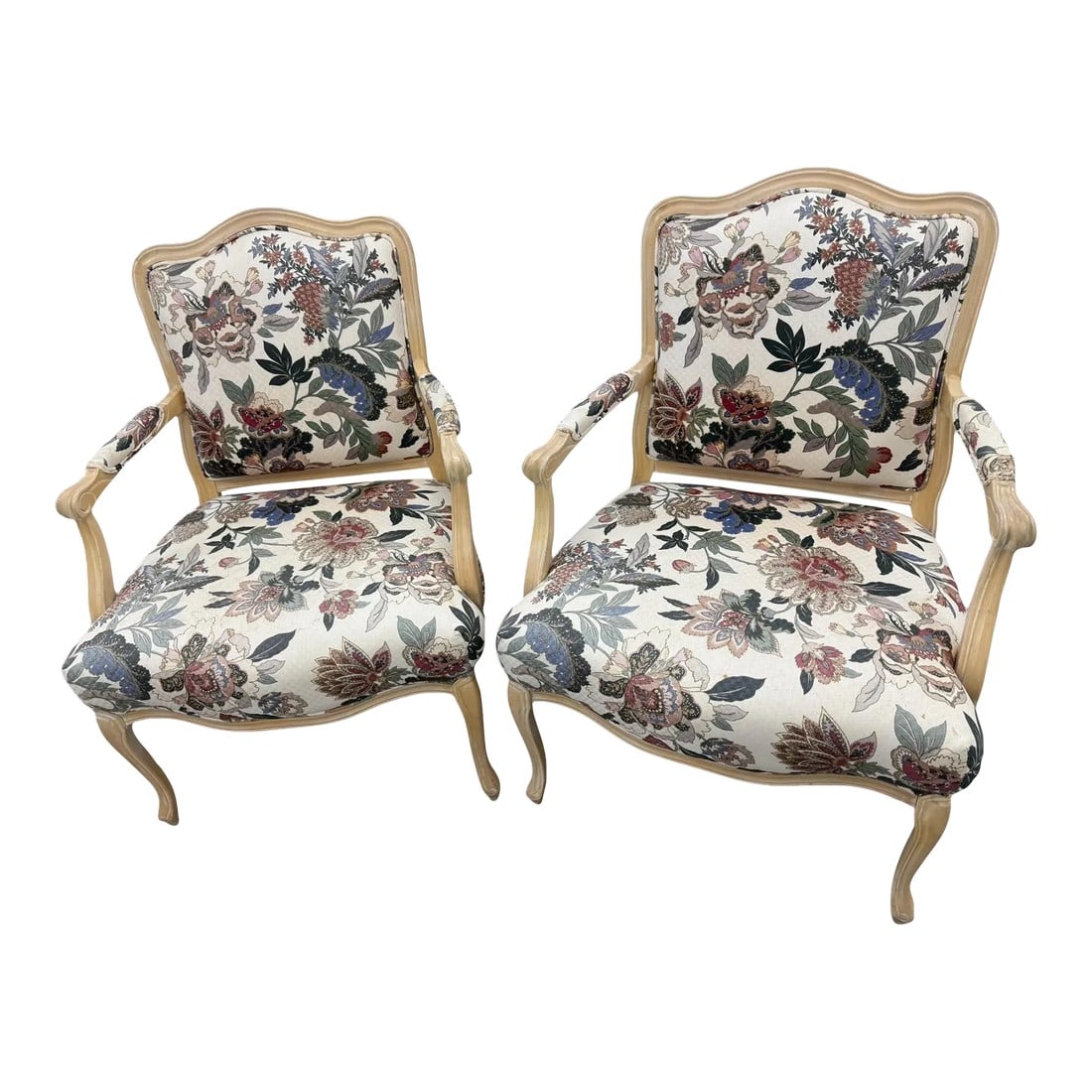Late 20th Century Pair of Floral Armchairs: Quick Hits: Late 20th century pair of floral armchairs French-style carved wood frames with scrolled arms Upholstered in a romantic floral jacquard Coordinates with a matching ottoman (available
