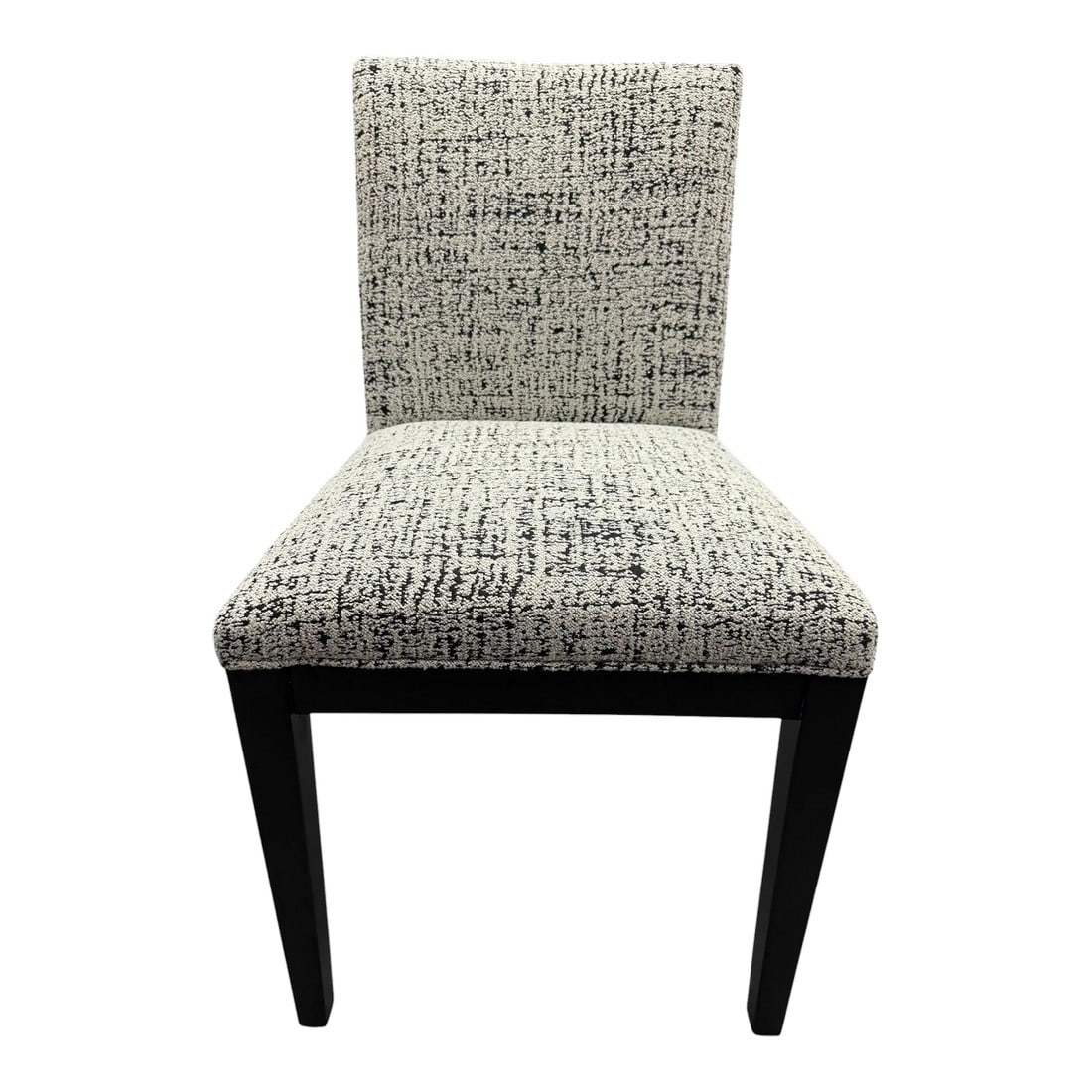 Arhaus Jasper Side Chair - Showroom Sample: Quick Hits: - Arhaus Jasper Side Chair - Showroom sample in excellent condition with tag still attached - Textured black-and-white fabric for a modern look - Minimalist style with sleek, clean lines