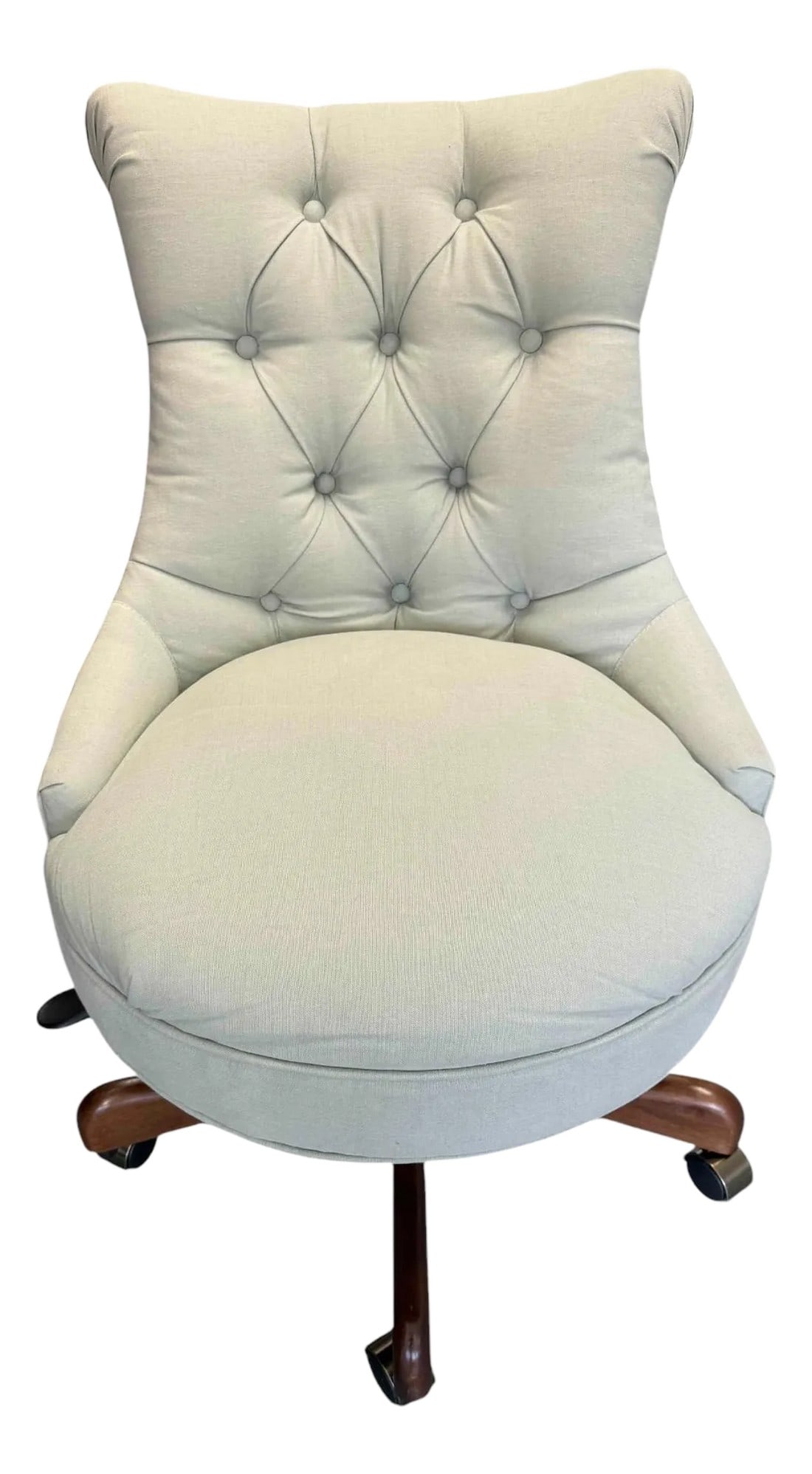 Ballard Designs Elle Tufted Desk Office Chair: Ballard Designs Elle Tufted Desk Office Chair The chair features a tufted back and is supported by brown legs and brass tone casters. It is adjustable and the seat raises to 21.5" height. The