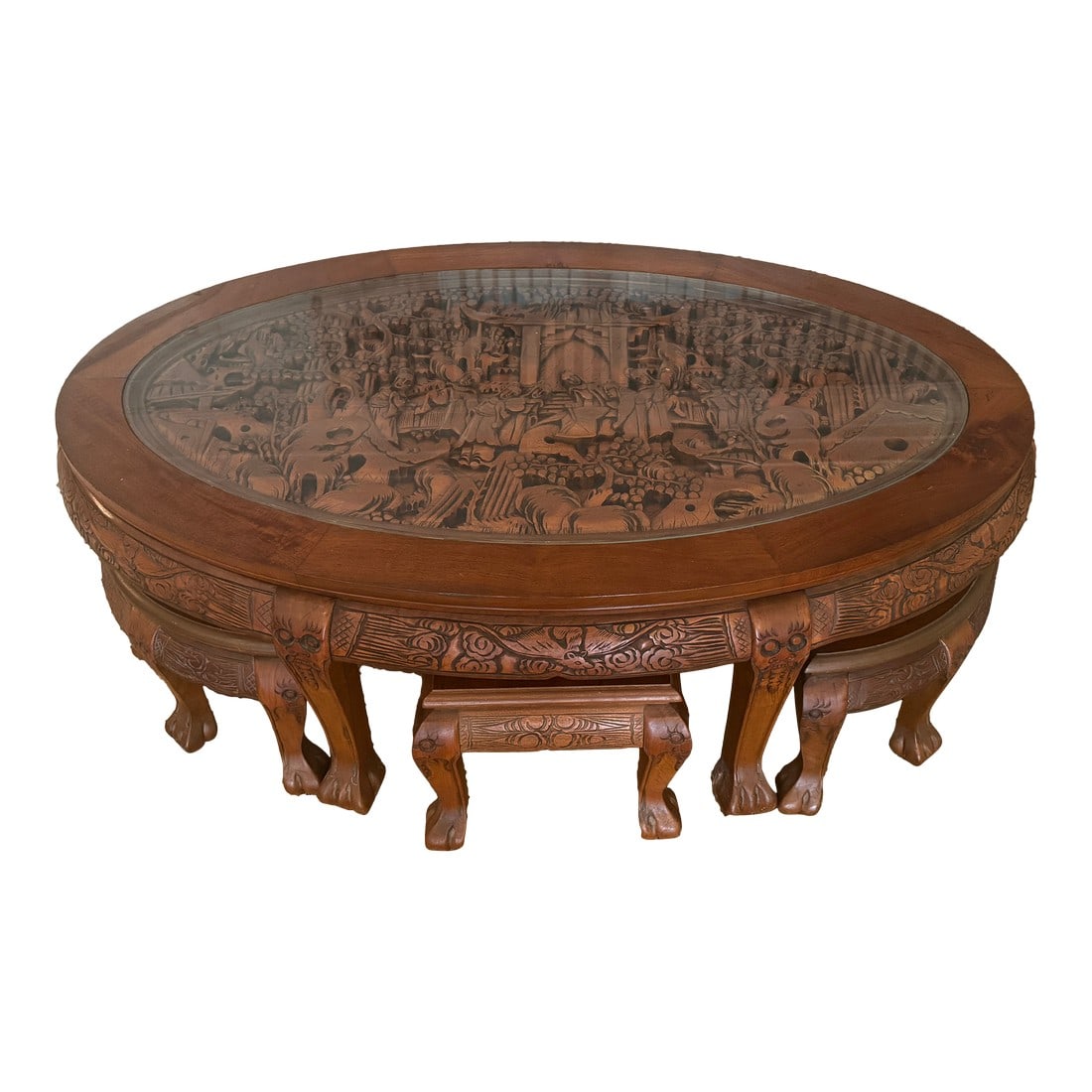 1980s Vintage Hand Carved Teak Coffee Tea Table With 6 Nesting Stools - Set of 7: This Vintage Oriental Hand-Carved Teak Coffee Tea Table with 6 Nesting Stools is a stunning piece that blends timeless craftsmanship with elegant design. Made from rich, durable teak wood, the table