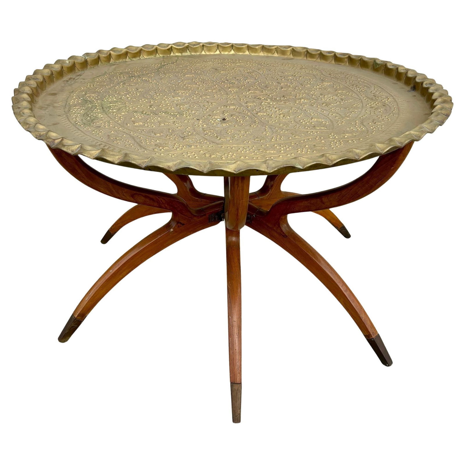 Mid-century Moroccan Moorish Tray Coffee Table: Title: Mid-century Moroccan Moorish Tray Coffee Table Description: Original hand-hammered brass Moroccan tray with a 6-leg folding Mide-century arched mahogany base, a seamless blend of the bohemian
