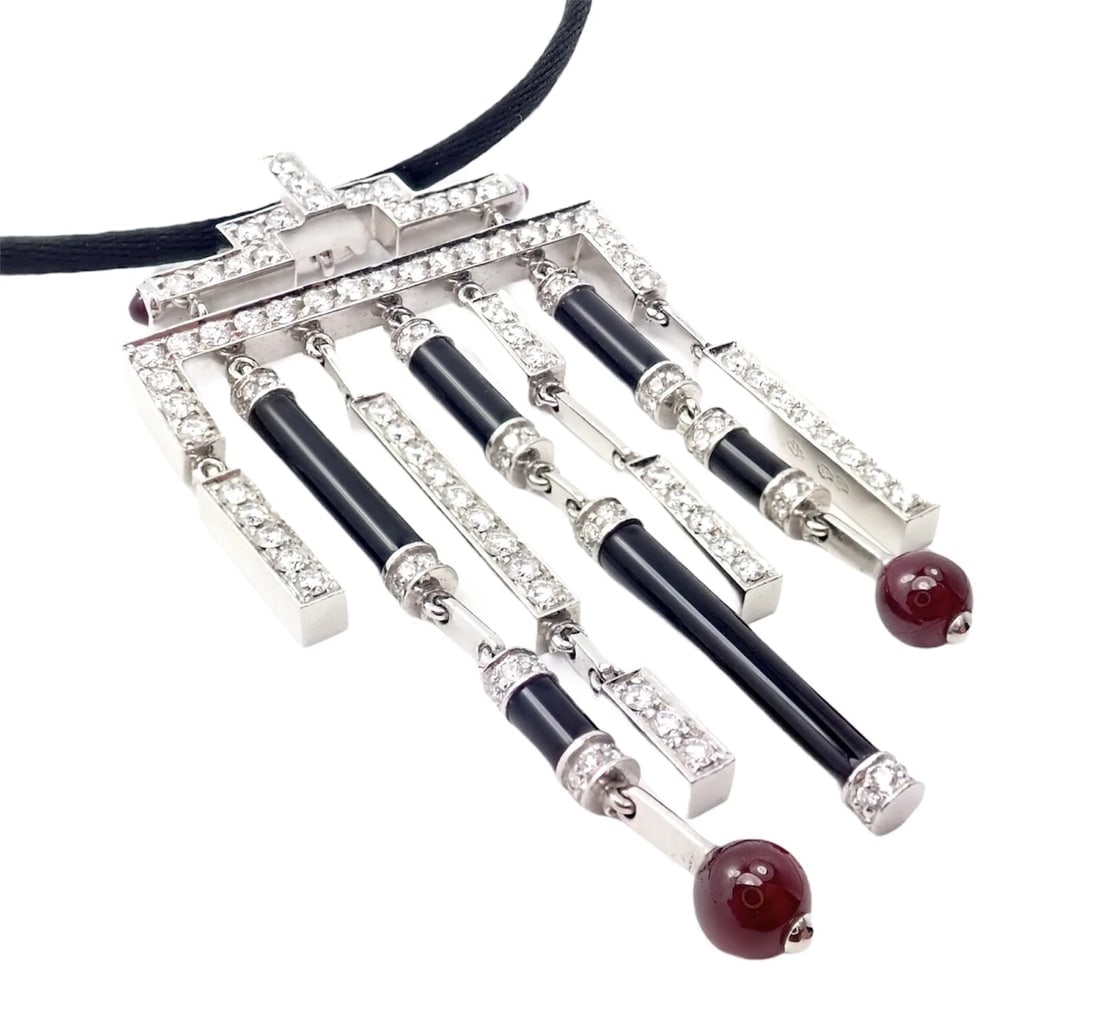 Cartier Le Baiser Du Dragon 18k White Gold Onyx Ruby Diamond Necklace w/ Paper: Title: Cartier Le Baiser Du Dragon 18k White Gold Onyx Ruby Diamond Necklace w/ Paper Description: Cartier Le Baiser Du Dragon 18k White Gold Onyx Ruby Diamond Necklace w/ Paper About This Piece: Meta
