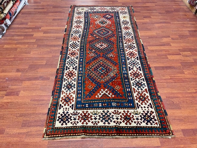 Antique Kazak caucasian Rug-4869: Title:Antique Kazak caucasian Rug-4869 Description:Gorgeous antique Kazak Caucasian rug from south west Caucasian, size 3 ft. 9 inches by 8 ft. 2 inches, circa late 19th century, with hooked design al
