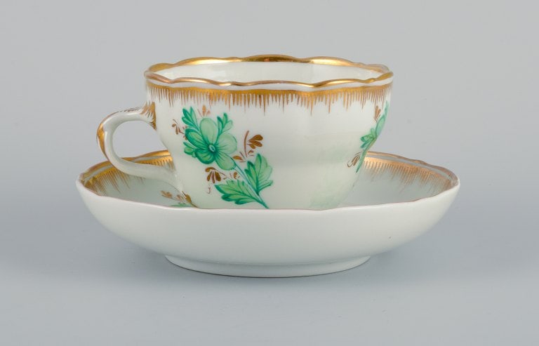 KPM, Berlin. Chocolate cup hand painted with green flowers and gold decoration.: KPM, Berlin. Chocolate cup hand painted with green flowers and gold decoration. Marked. Mid 19th century. First factory quality. In excellent condition with minimal wear. With birthday inscription.