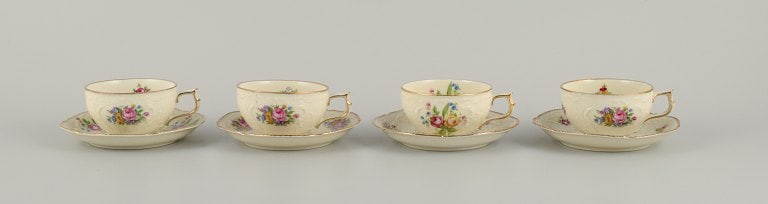 Rosenthal, Germany, "Sanssouci". Four mocha cups with saucers decorated with flowers and gold. (1 of 7)