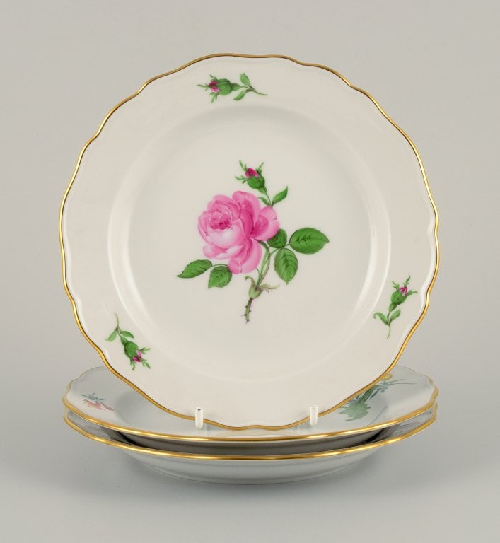 Meissen, Germany, three plates hand painted with flowers and gold: Meissen, Germany, three plates hand painted with flowers and gold decoration. Approx. 1900. Third factory quality. In perfect condition. Dimensions: D 18.2 cm. Reserve: $210.00 Shipping:Domestic: