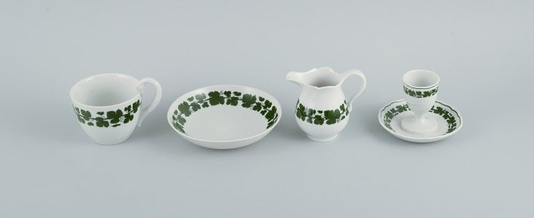 Meissen. Green Ivy Vine. Four parts consisting of egg cup, cup, saucer and cream jug. (1 of 7)