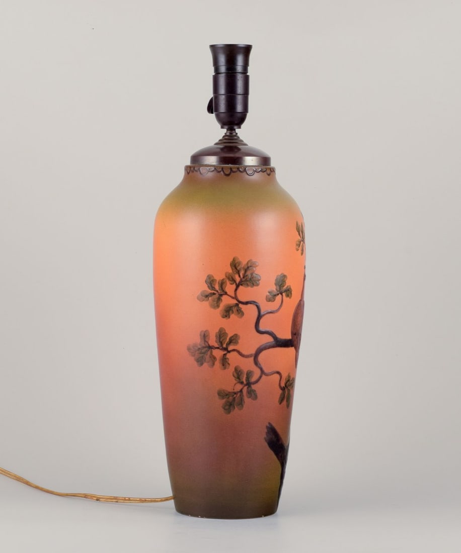 Ipsen's, Denmark. Large table lamp in ceramic. Motif of peacocks sitting in a tree. Approx. 1920 - 5