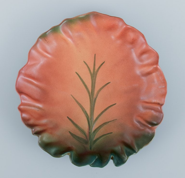 Ipsens Enke, Denmark. Ceramic bowl with wavy rim. Design depicting plant growth. Glaze in orange and - 2