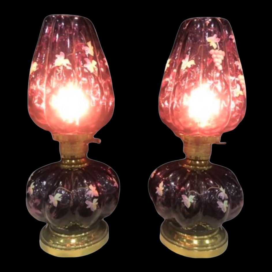 Pair of 1960s Fenton Plum Colored Parlor Table Lamps: Pair of Fenton Plum Colored Diamond Optic Lamps with hand painted grapes by D. Roshison signed on inside bottom of top shade. Lamps are in pristine, working order with thick glass, no chipping or