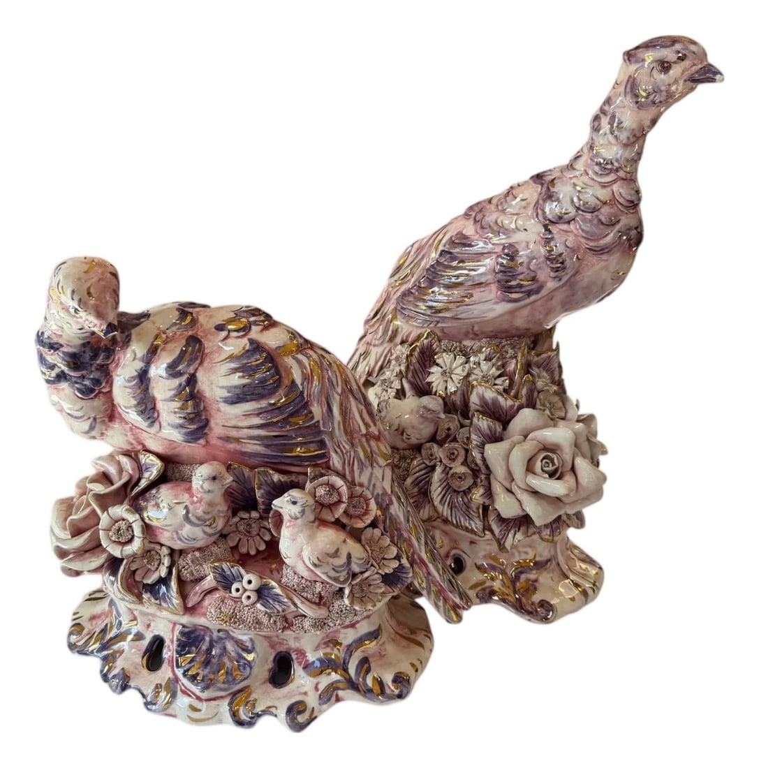 Freeman Leidy Pair of Pheasant Figurines: Freeman Leidy Pair of Pheasants Figurines There are male and female figurines. The male is taller with a large floral base. The female is smaller, also with a floral base. The female also has
