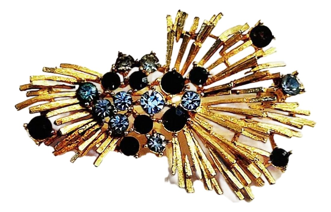 Lisner Starburst Spray Brooch With Blue Rhinestones - Signed: Vintage signed Lisner brooch stylized with a spray or gathered wheat design with prong-set stones and a bright gold tone finish. There are 2 shades of blue rhinestones, light and sapphire. This design