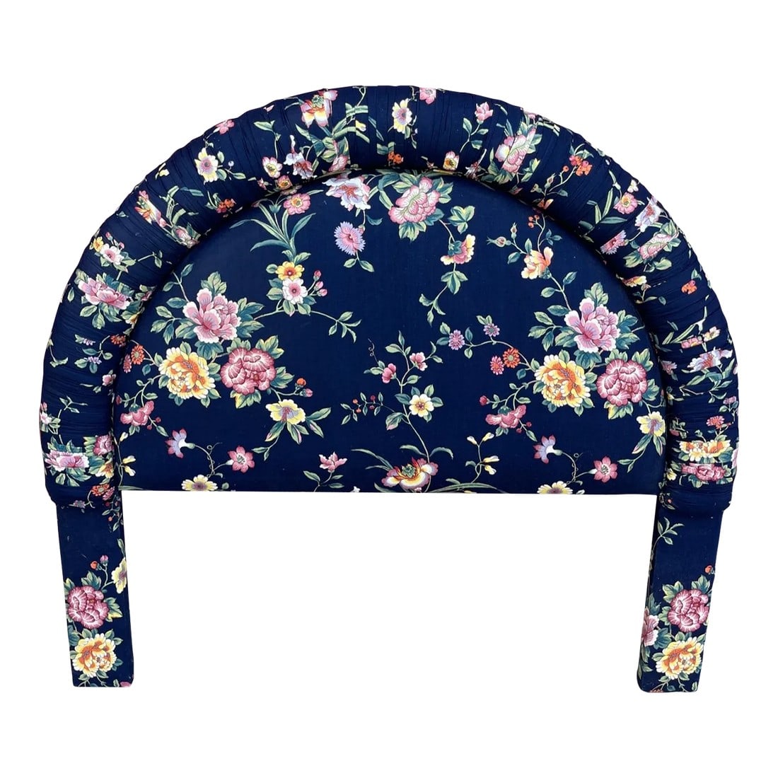 1980s Navy Blue Floral Upholstered Twin Headboard: Navy Blue Floral Upholstered Twin Headboard with rushing around the half moon shape. Navy blue with pink, yellow and green floral print. Thick padding. 48in h x 54in w x 5in d Condition: