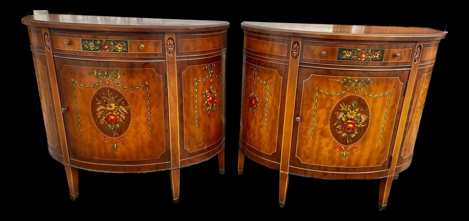 Mid 20th Century Pair of Grand Rapids Imperial Furniture Demilune Adams Style Paint Decorated Cabine: This is a sweet pair of demilune cabinets with beautiful grained veneer painted in the Adams style, each having a gorgeous floral bouquet on the front and smaller ones on the sides surrounded by