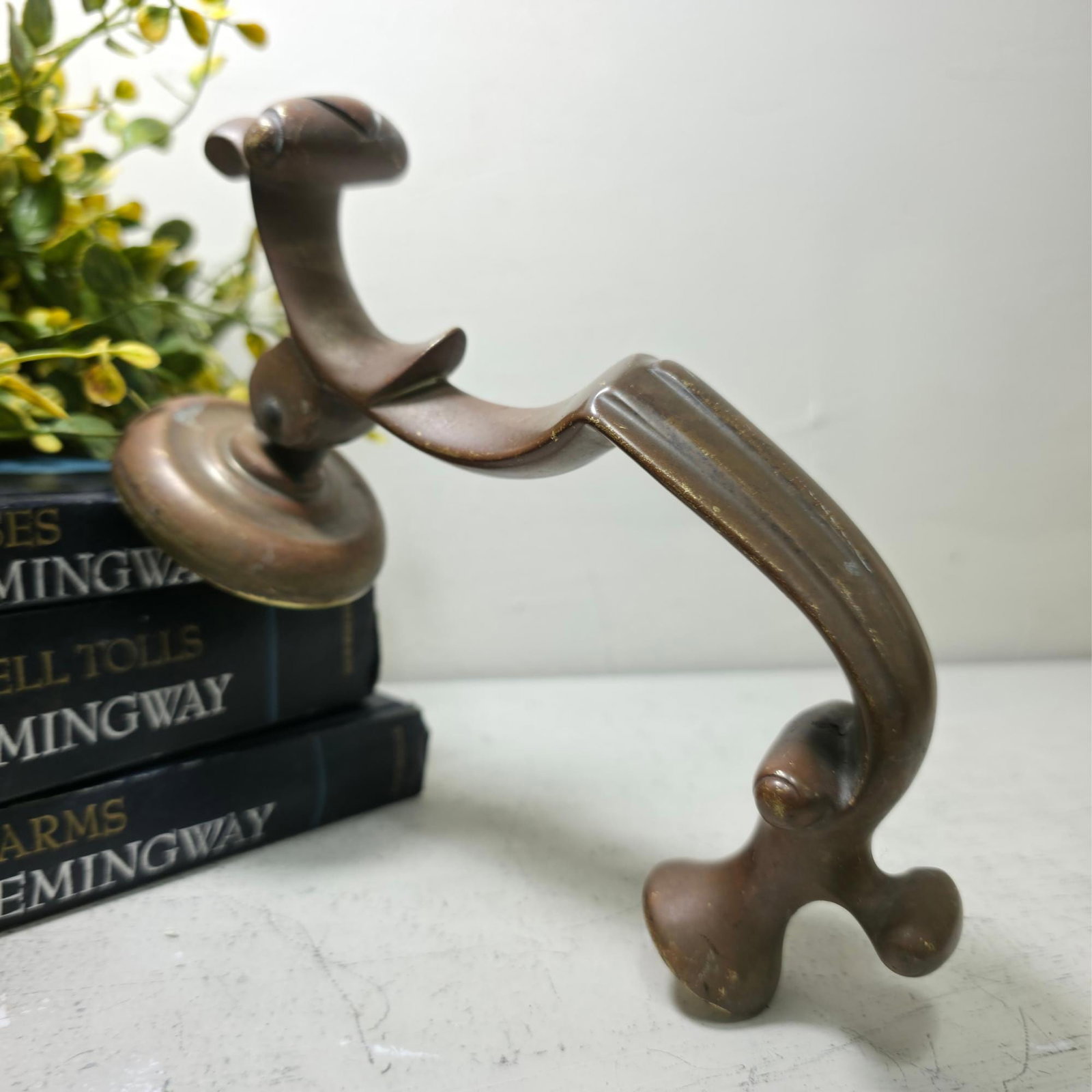 Vintage Brass Lever Door Knocker, Sculptural Curved Handle with Round Strike Plate, Traditional: Title: Vintage Brass Lever Door Knocker, Sculptural Curved Handle with Round Strike Plate, Traditional Colonial Entry Decor, 8” Description: A sculptural vintage brass door knocker with a distin