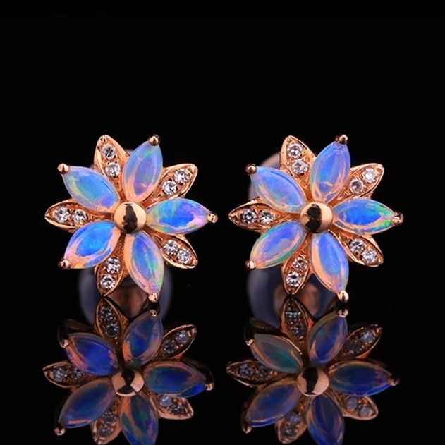 14K GOLD 1.04 CTW NATURAL OPAL & DIAMOND EARRINGS: Title:14K GOLD 1.04 CTW NATURAL OPAL & DIAMOND EARRINGS Description:Ref:230656072Gold Content:14K GoldMain Gemstone:OpalShape:MarquiseCarat Weight:1.00ct Color:WhiteTreatment:NaturalCut Grade:GAdjacen