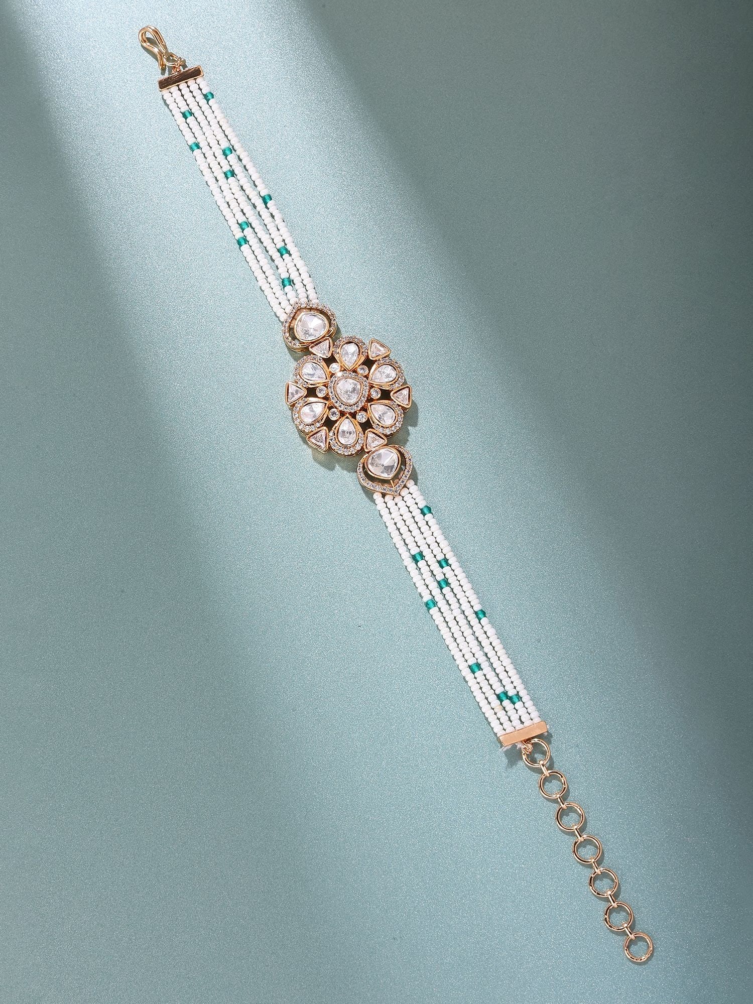 Floral Kundan Stone Studded Multi-Strand Adjustable Bracelet: Title:Floral Kundan Stone Studded Multi-Strand Adjustable BraceletDescription:Floral Kundan Stone Studded Multi-Strand Adjustable BraceletReference:itemcode : JA0201 Reserve: $38.00 