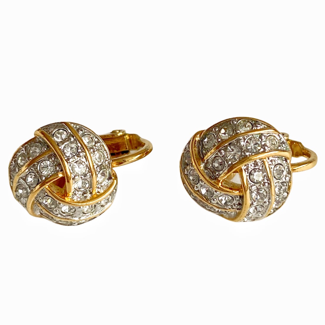 Vintage gold plated Shimmering Knot handmade earclips earrings: Title: Vintage gold plated Shimmering Knot handmade earclips earrings Description:These earrings are vintage and very high quality Stylish gold plated clip on earrings. Shimmering Knot -- The swirled 