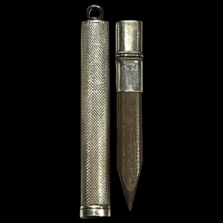 Edwardian Silver Carpenters Pencil Case/Pendant: Title: Edwardian Silver Carpenters Pencil Case/Pendant Description: Edwardian Silver Carpenters Pencil Case/Pendant Hallmarked: No Hallmark Seen. Tested as 800 Silver Weighs 6.7 grams Measures Approx.