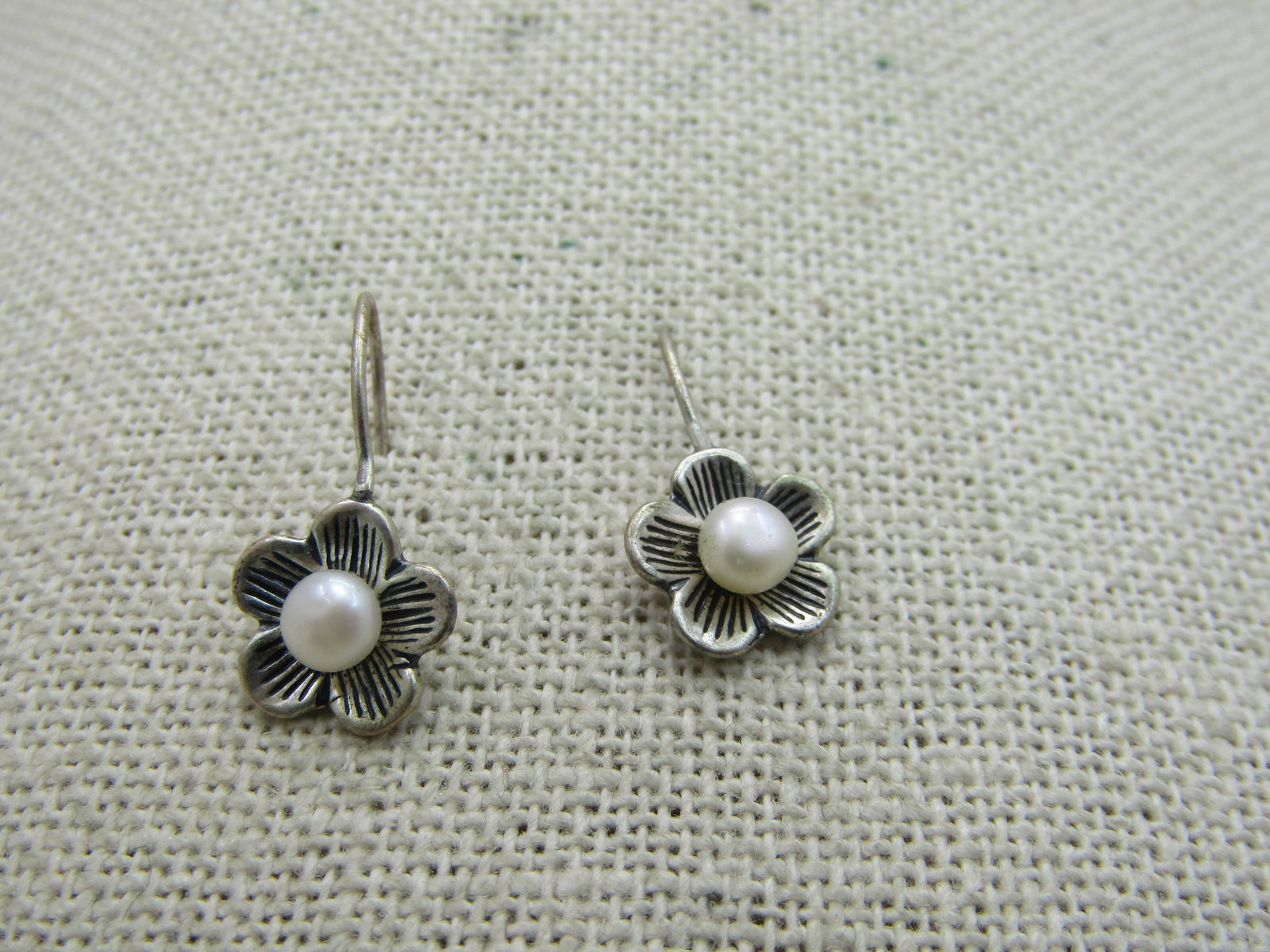 Vintage Sterling Blossom Drop Earrings, 4mm Cultured Pearl: Vintage Sterling Blossom Drop Earrings, 4mm Cultured Pearl, 3/4" long from curve in hook post and the blossoms are appx. 1/2" across and weight is 1.75 gr. Five petals with ridged accents. Signed S