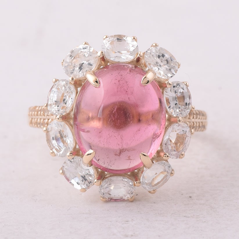 8.10 Ct Oval Tourmaline 9K Gold Ring: 8.10 Total Carat Tourmaline 9K Gold Ring Specifications: Total Weight 3.835 g Center Gemstone Tourmaline Gemstone Carat Weight 5.57 Carats Gemstone Measurements 12X10X5.70 mm Additional Gemstones Whit