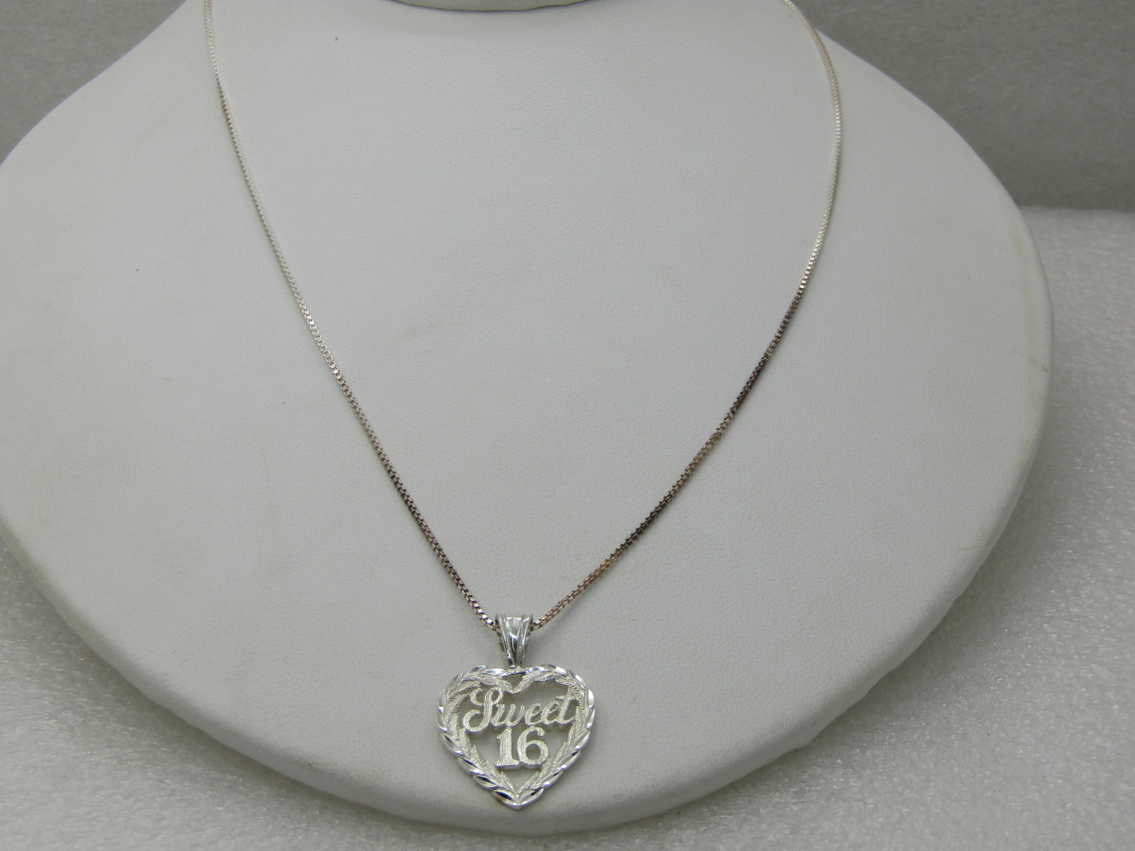 Vintage Sterling Sweet 16 Heart Necklace, 18" Box Chain, Signed: Vintage Sterling Sweet 16 Heart Necklace, 18" Box Chain, Signed GSJ, weight is appx. 4.50 gr. Box chain is appx. 1mm wide. Marked .925 and tested. (INV. WCOV.11 SS2401 LET LD 10/17/20) Reserve: $30.00