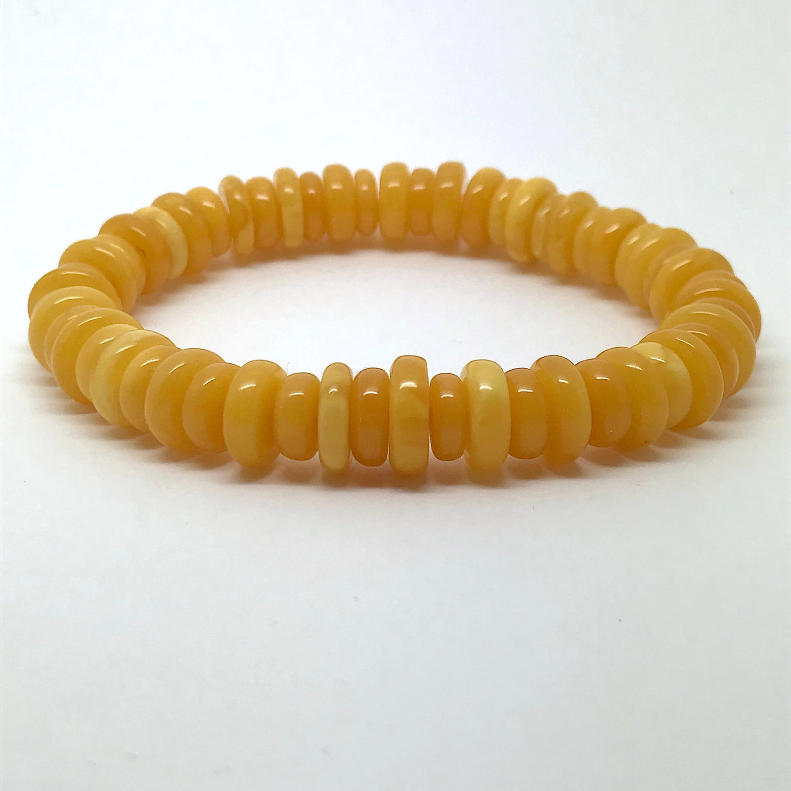 Unique and Remarkable Amber Bracelet made from Barrel shaped Amber beads: Title:Unique and Remarkable Amber Bracelet made from Barrel shaped Amber beadsMetal:NoneGemstone:AmberWeight:12.0 gSize:Bead size: 11.0 x 8.0 mm Bead size: 0.433 x 0.315 inches Made of:(Reconstituted