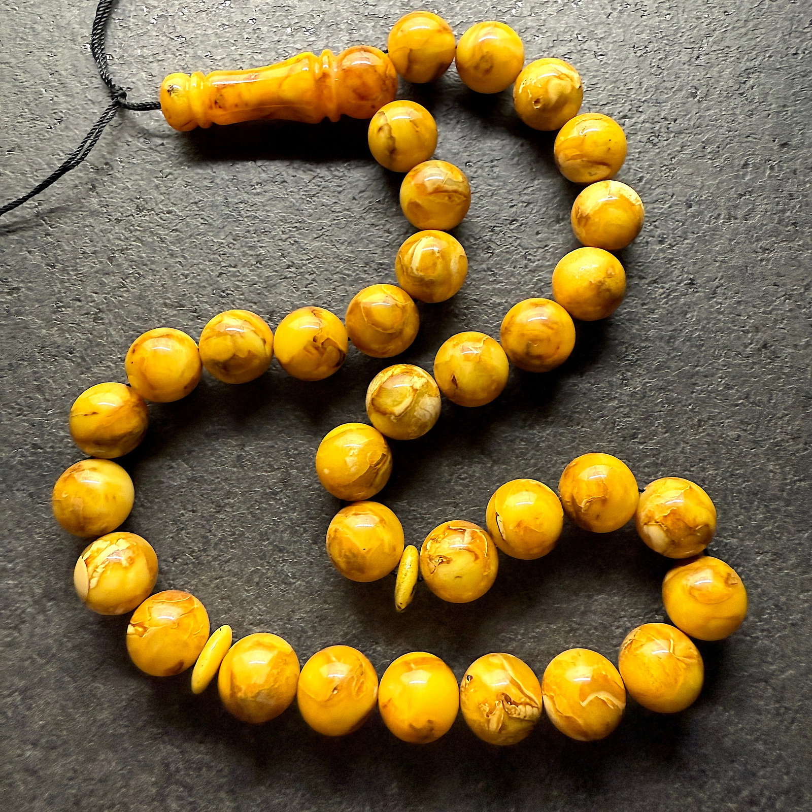 Unique and Outstanding Amber Tesbih made from Round Amber beads: Title:Unique and Outstanding Amber Tesbih made from Round Amber beadsMetal:NoneGemstone:AmberWeight:46.0 gSize:Bead size: 13.0 mm Bead size: 0.512 inches Made of:(Reconstituted Amber or Whole