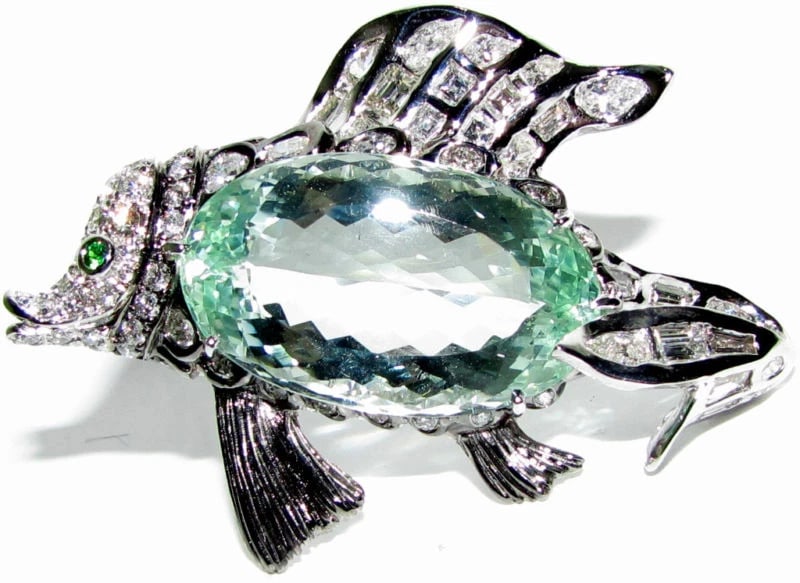 GIA 57.37CT NATURAL GREEN BERYL FISH BROOCH PENDANT 18kt**: Title: GIA 57.37CT NATURAL GREEN BERYL FISH BROOCH PENDANT 18kt** Description: 47.37ct. GIA Certified "Green Beryl" 10.00ct. Diamonds G-H color Vs-2 clarity 18kt. white gold 37.1 grams measures: 61.50