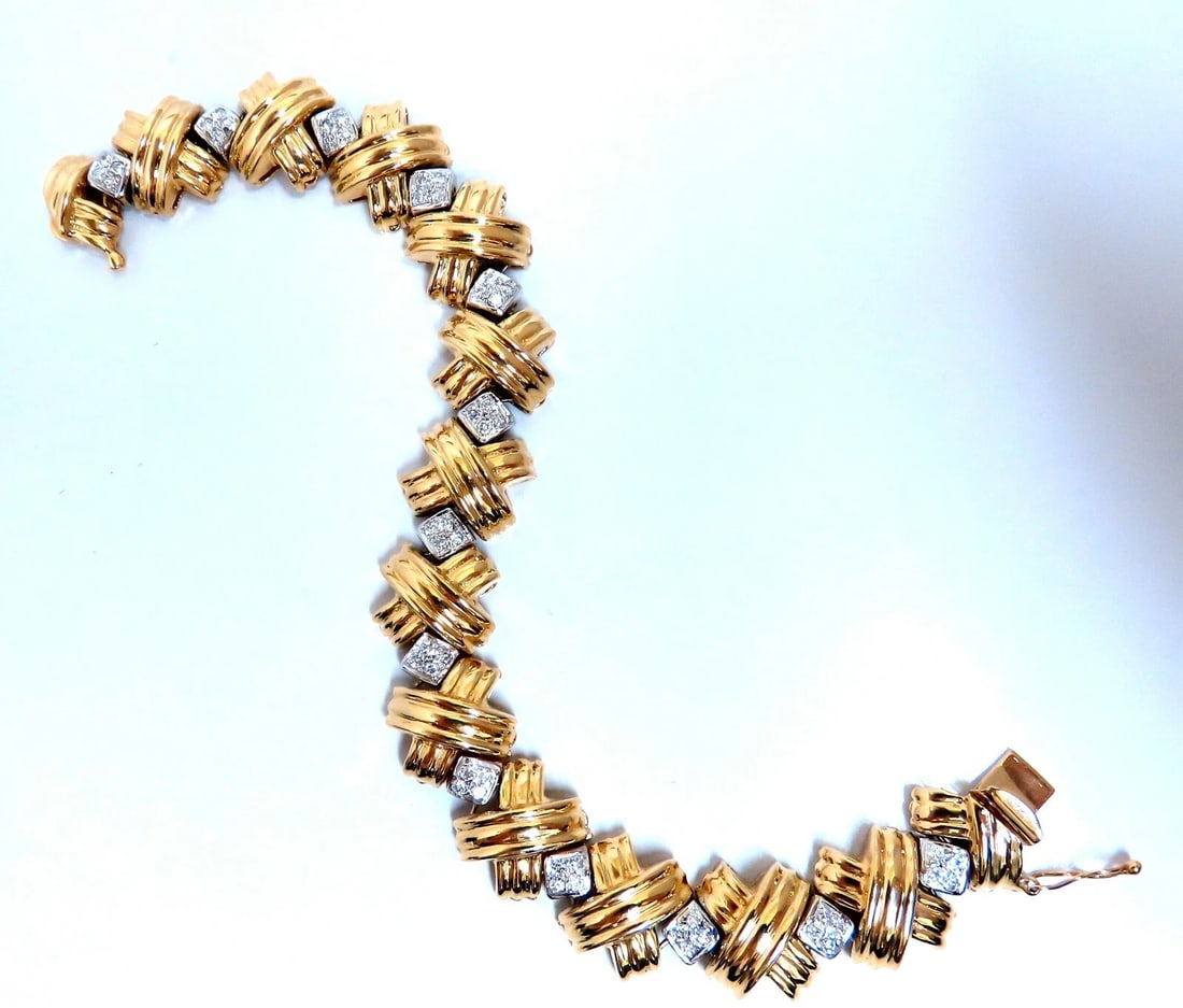 Natural Diamonds X Bracelet wide caliber 14kt two toned 39 grams **: Title: Natural Diamonds X Bracelet wide caliber 14kt two toned 39 grams ** Description: Classix Wide Caliber X 1.50ct. Diamonds"X" bracelet Each "x" measures: 14.75mm diameter. Round Diamonds: H-color