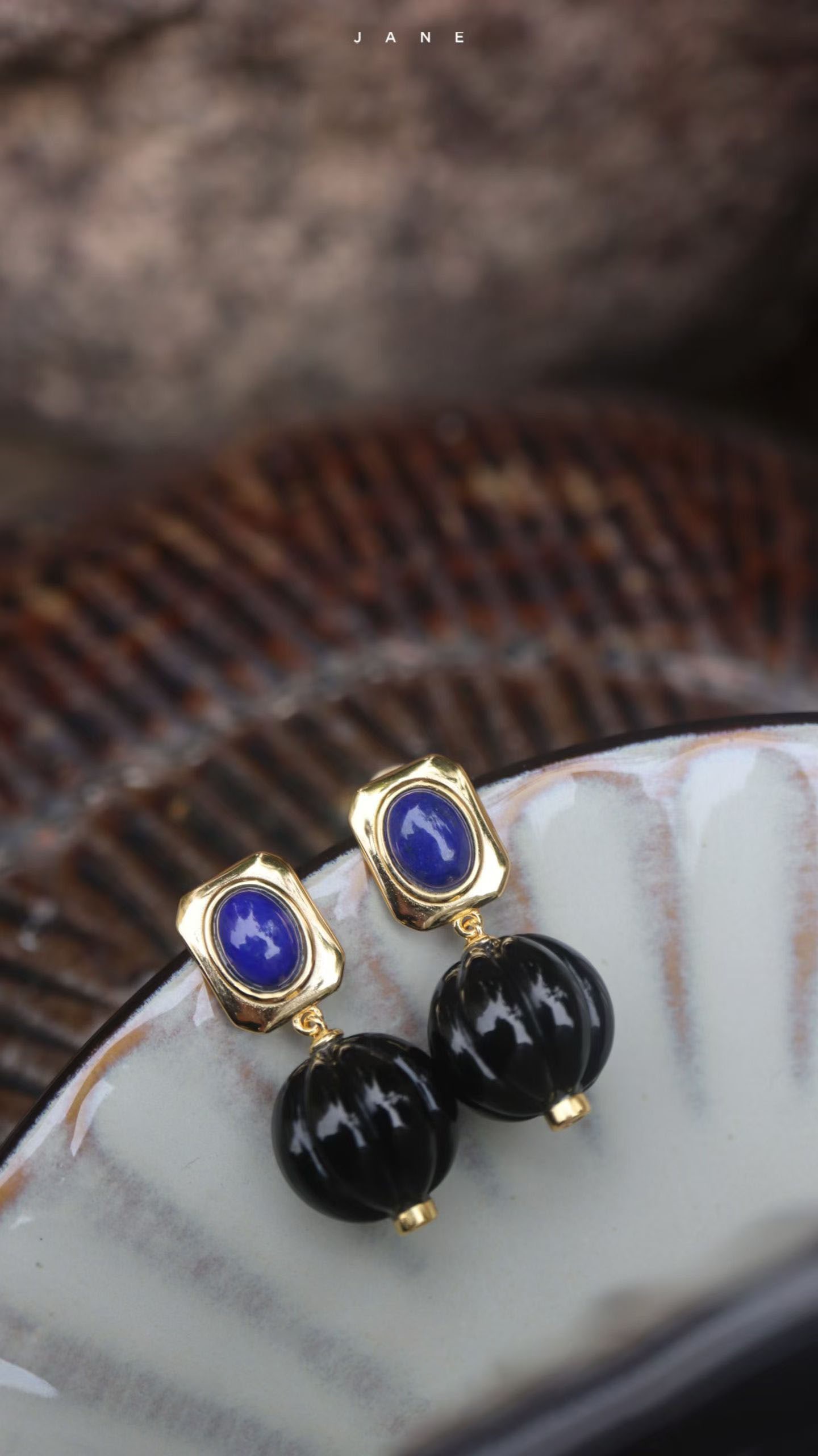 Silver Lapis Lazuli and Onyx Bead Earrings: Title: Silver Lapis Lazuli and Onyx Bead Earrings Description: This Earrings showcases the natural allure of lapis lazuli and onyx, crafted into exquisite pumpkin-shaped beads. The meticulous craftsma