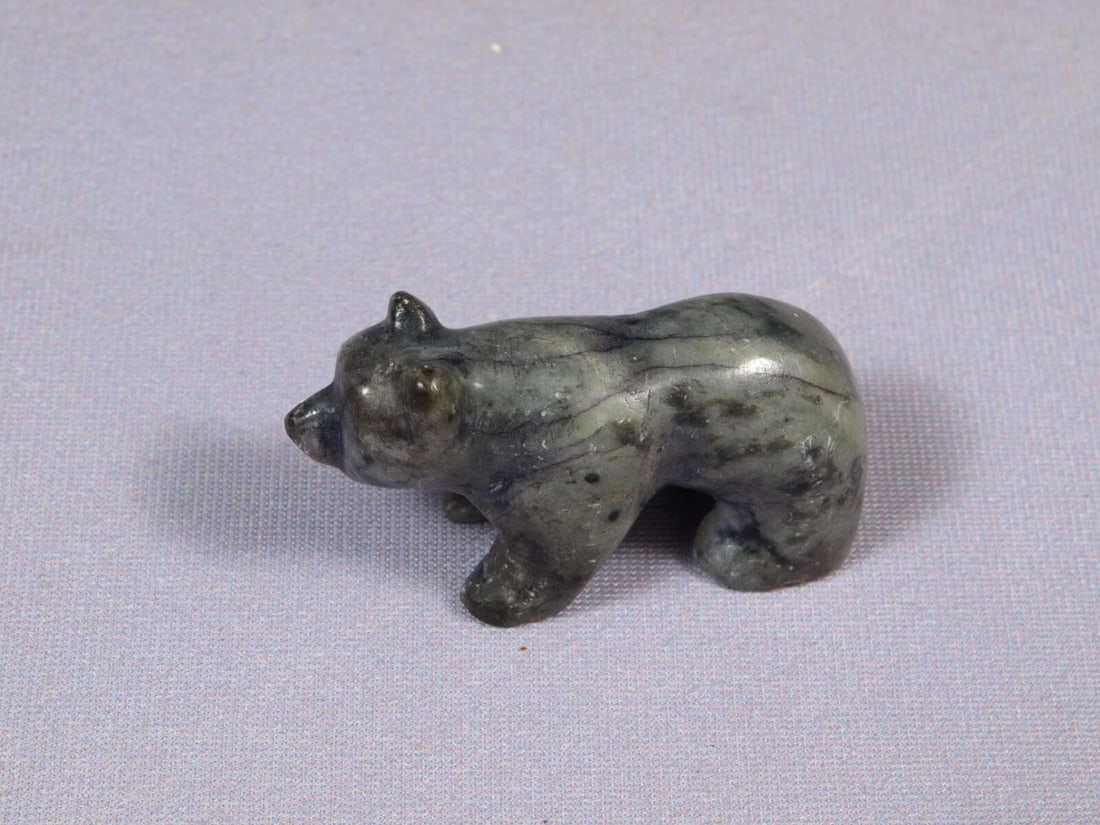 Inuit Eskimo Native Vintage Soapstone Carving BEAR LARRY BEAUCAGE Small '97: This is a vintage Primitive Native American Eskimo Inuit Bear Figurine.. The figurine is made from stone and is very beautiful.. It was made by LARRY BEAUCAGE in 1997It is app. 2" longIt is in good