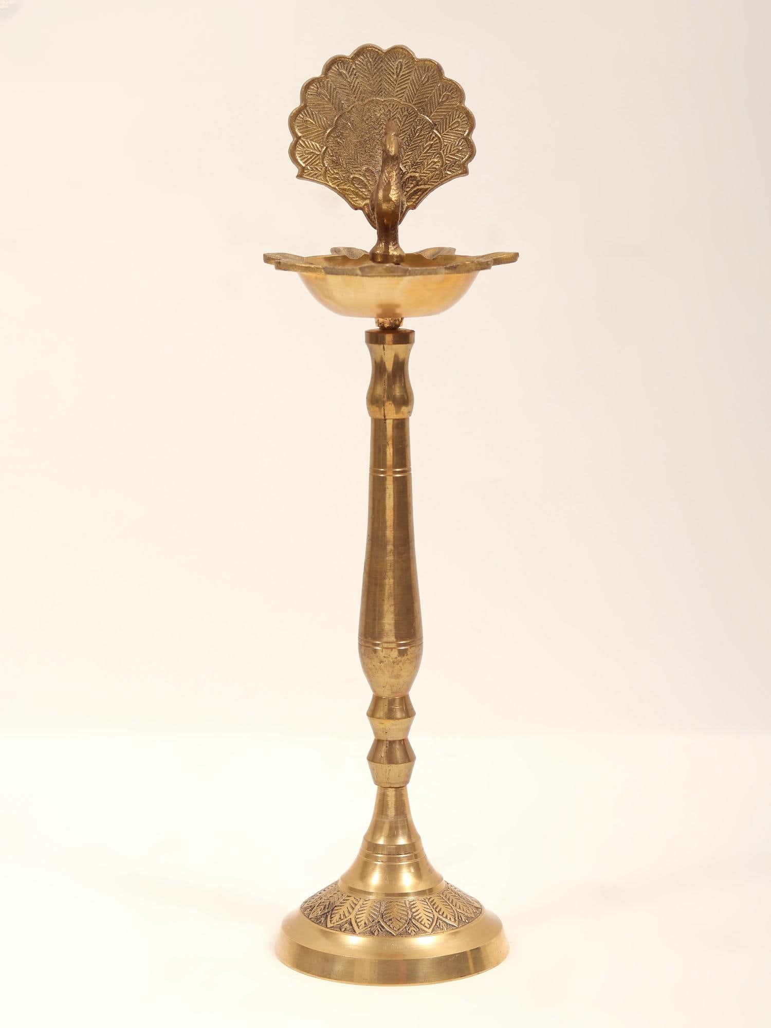 Seven Wicks Peacock Design Lamp (Inferior Quality): Title: Seven Wicks Peacock Design Lamp (Inferior Quality) Description: Category: Ritual & Puja Items Statues Reserve: $156.00 Shipping: Domestic: Shipping rates are determined by destination Internati