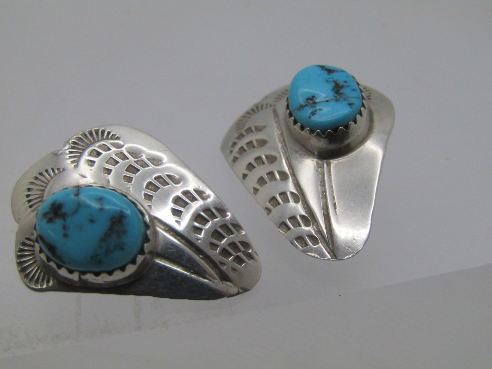 Vintage Sterling Turquoise Southwestern Earrings, Clip, 1980's, Signed TG.: Vintage Sterling Turquoise Southwestern Earrings, Clip, 1980's. Sawtooth bezel-set turquoiise nuggets that are appx. 8.5mm by 6mm on a stamped base that is appx. 1" by .75". The turquoise is set up on