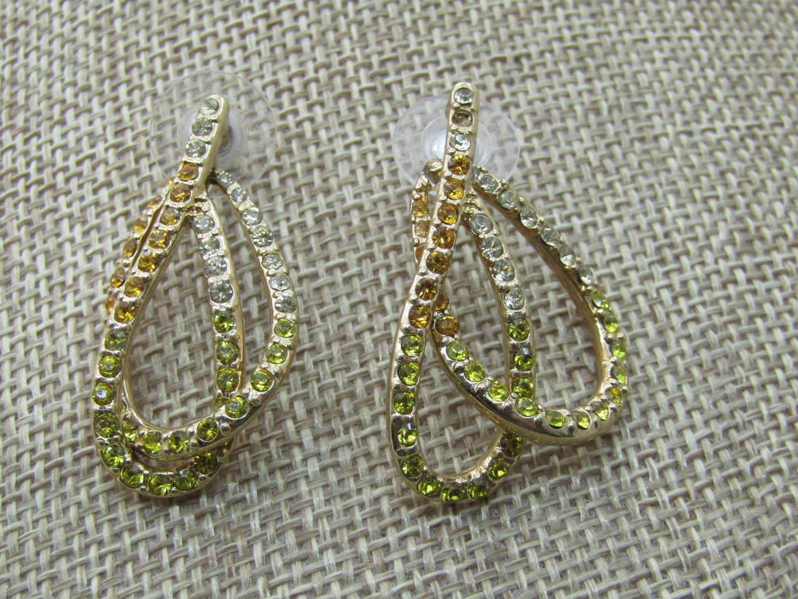 Vintage Clear & Yellow Rhinestone Earrings, Double-Looped Drops, Pierced: Vintage Clear & Yellow Rhinestone Earrings, Double-Looped Drops, Pierced. 1.5" with two loops - enlongaged ovals with stones t hroughout, yellow and clear. 1980's. Not signed by the maker. The wider l